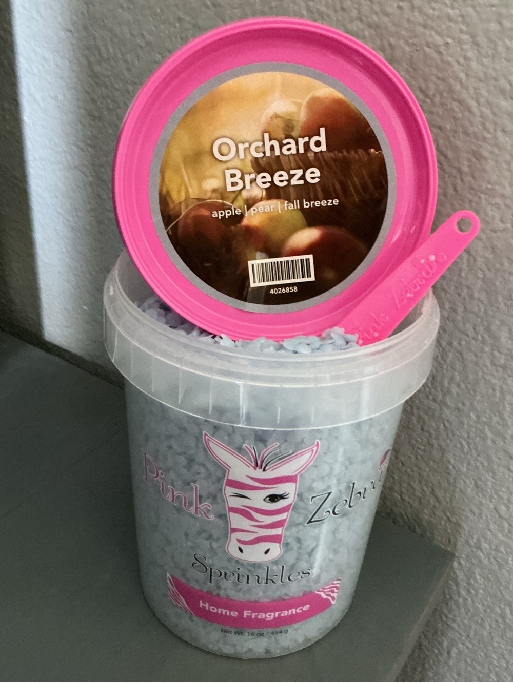 Orchard Breeze Pink Zebra Wax Melts in a 4 oz blend bag